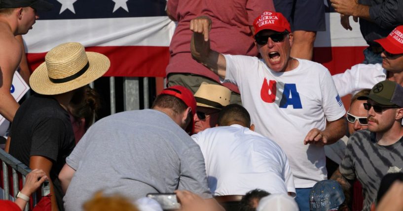 Attendees scatter after gunfire rang out during a campaign rally for Republican presidential candidate, former U.S. President Donald Trump at Butler Farm Show Inc. on July 13, 2024 in Butler, Pennsylvania.