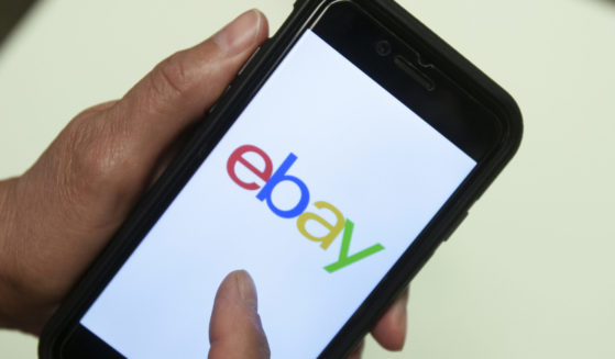 An eBay app is shown on a mobile phone in Miami on July 11, 2019.