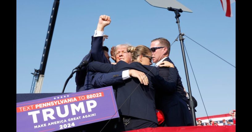 Former President Donald Trump rushed off stage.