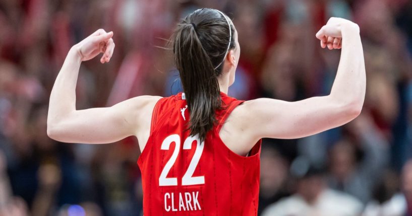 Caitlin Clark #22 of the Indiana Fever reacts to the Indiana Fever bench during the second half against the New York Liberty at Gainbridge Fieldhouse on July 6, 2024 in Indianapolis, Indiana.