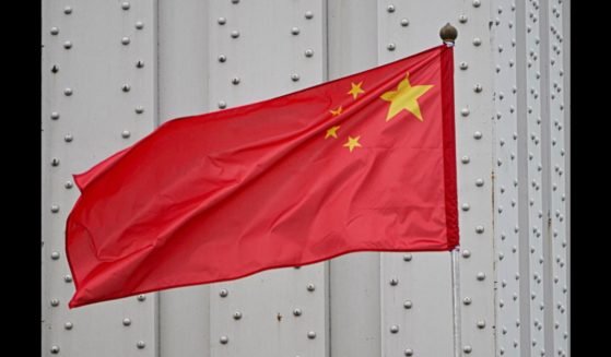 A Chinese national flag decorates the Erzsebet Bridge in Budapest, Hungary on May 8, 2024. Chinese President Xi Jinping pays a three day official visit to Budapest starting from the evening of May 8, 2024.