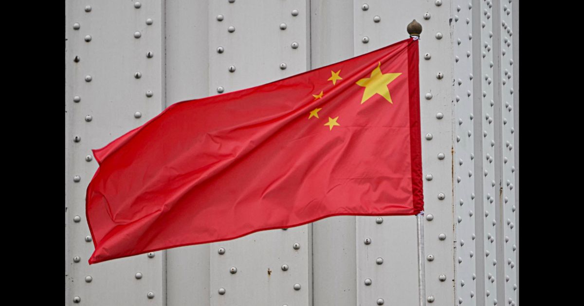 A Chinese national flag decorates the Erzsebet Bridge in Budapest, Hungary on May 8, 2024. Chinese President Xi Jinping pays a three day official visit to Budapest starting from the evening of May 8, 2024.