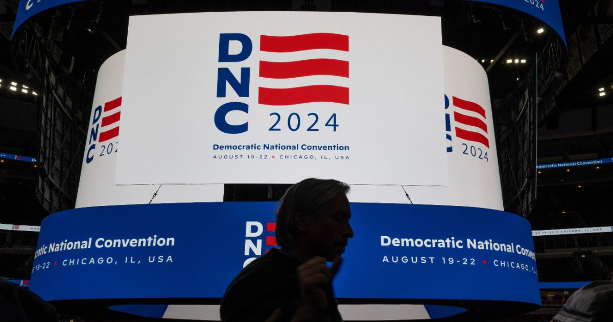 The logo for the Democratic National Convention is displayed on the scoreboard at the United Center during a media walkthrough on January 18, 2024 in Chicago, Illinois. The convention is scheduled to be held in Chicago from August 19-22, 2024.