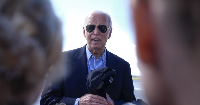 President Joe Biden speaks to reporters on the tarmac before departing at Dane County Regional Airport in Madison, Wisconsin, following a campaign visit on Friday.