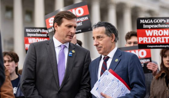 (L-R) Rep. Dan Goldman (D-NY) speaks with Rep. Jamie Raskin (D-MD) during a news conference about Republican efforts to open an impeachment inquiry into U.S. President Joe Biden, outside the U.S. Capitol on December 13, 2023 in Washington, DC.