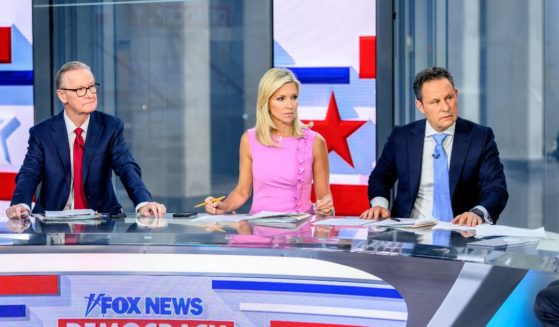 Hosts Steve Doocy, Ainsley Earhardt and Brian Kilmeade with presidential candidate Robert F. Kennedy Jr. (not pictured) as he visits "Fox & Friends" at Fox News Channel Studios on April 2, 2024 in New York City.