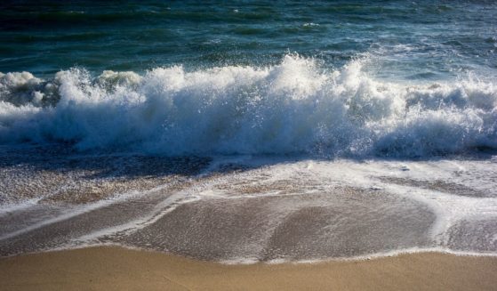 Waves break on the beach September 23, 2015 on Nantucket Island in Wauwinet, Massachusetts.