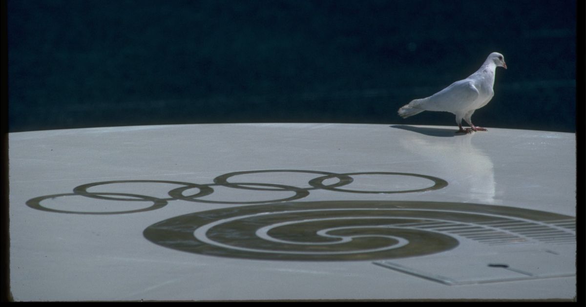 17 SEP 1988: A SINGLE DOVE LANDS UPON THE OLYMPIC SYMBOL DURING THE OPENING CEREMONY OF THE 1988 SEOUL OLYMPICS.