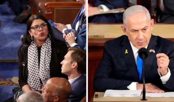 (L) U.S. Rep. Rashida Tlaib (D-MI) arrives for the Israeli Prime Minister Benjamin Netanyahu address to a joint meeting of Congress in the chamber of the House of Representatives at the U.S. Capitol on July 24, 2024 in Washington, DC. (R) Israeli Prime Minister Benjamin Netanyahu addresses a joint meeting of Congress in the chamber of the House of Representatives at the U.S. Capitol on July 24, 2024 in Washington, DC.