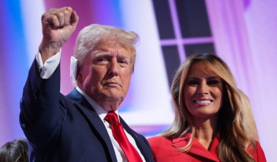 Former first lady Melania Trump joins Republican presidential nominee, former U.S. President Donald Trump on stage after he officially accepted the Republican presidential nomination on the fourth day of the Republican National Convention at the Fiserv Forum on July 18, 2024 in Milwaukee, Wisconsin.