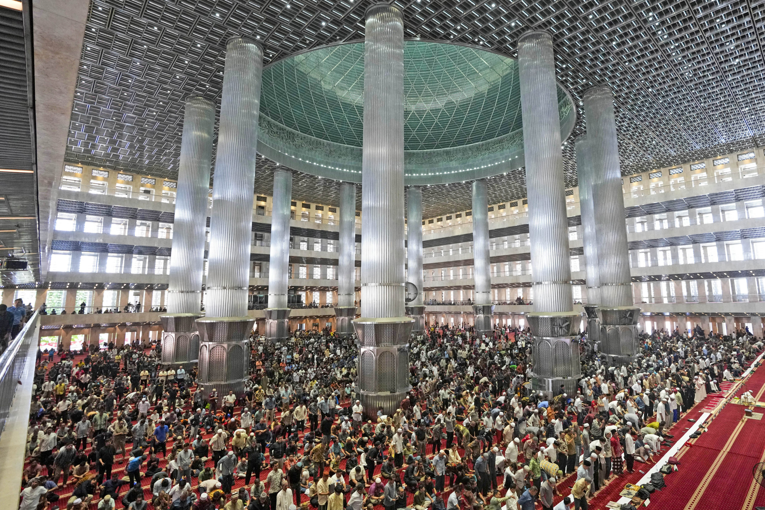 Muslim men attend Friday prayer at Istiqlal Mosque in Jakarta, Indonesia, Friday, August 9, 2024, where Pope Francis is scheduled to hold an interfaith meeting on September 5th.