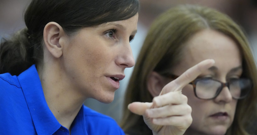 Kouri Richins, a Utah mother of three who wrote a children's book about coping with grief after her husband's death and was later accused of fatally poisoning him, looks on during a court hearing on Tuesday in Park City, Utah.