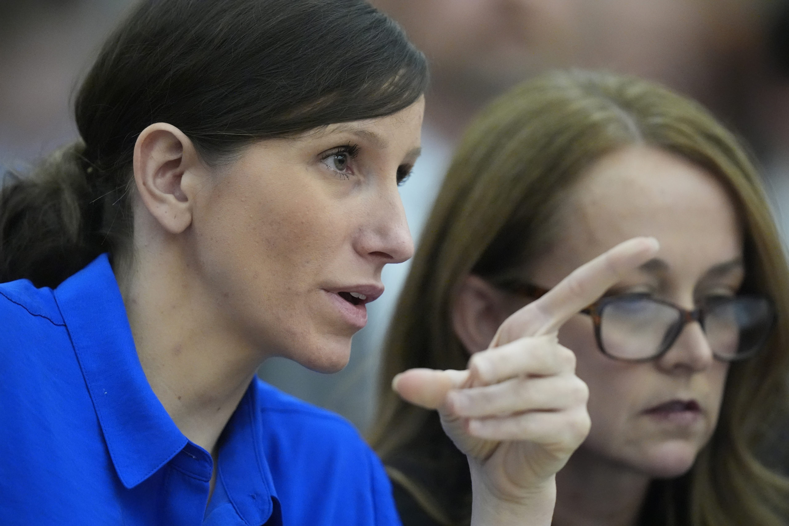 Kouri Richins, a Utah mother of three who wrote a children's book about coping with grief after her husband's death and was later accused of fatally poisoning him, looks on during a court hearing on Tuesday in Park City, Utah.