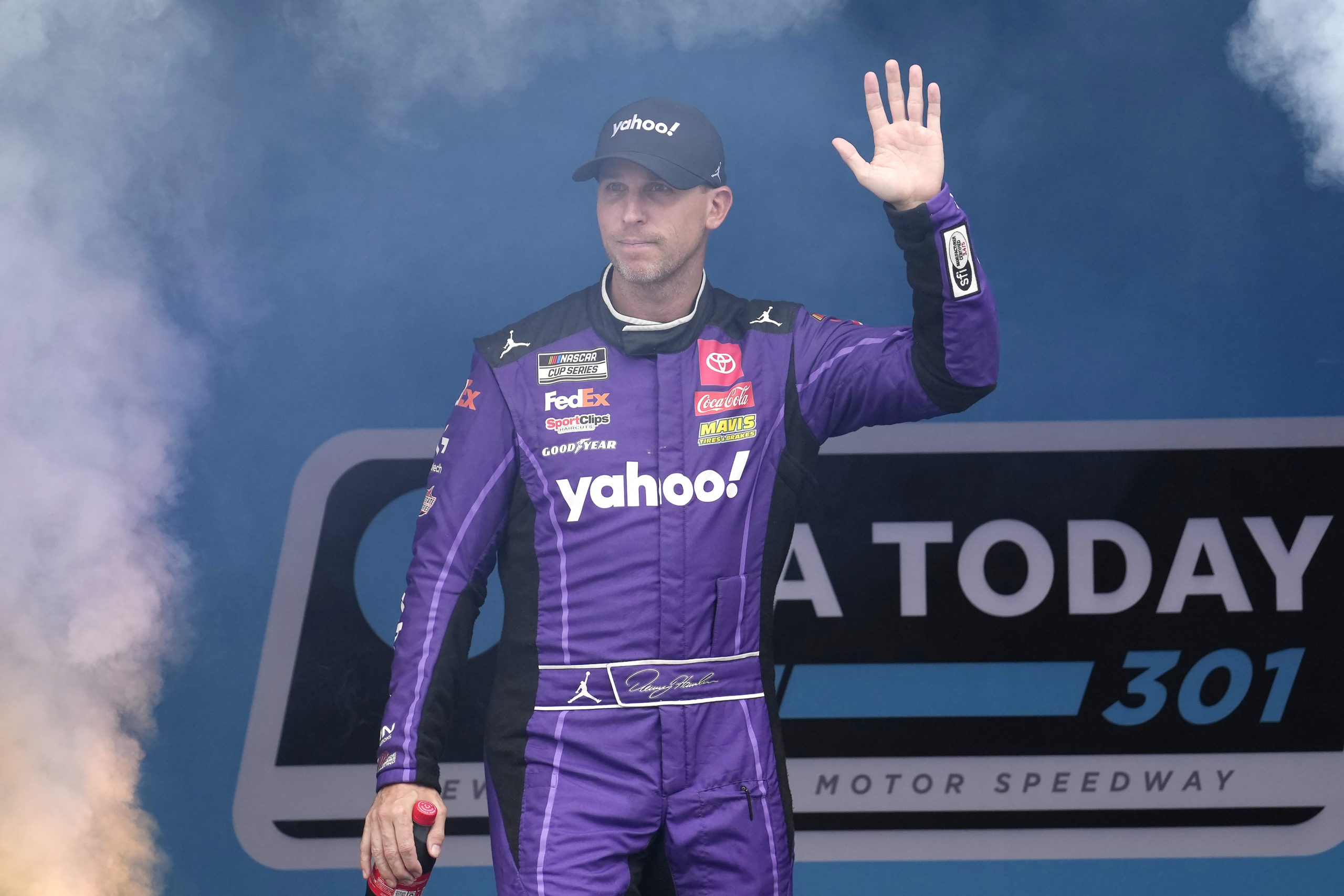 Denny Hamlin is introduced before a NASCAR Cup Series race on June 23, at New Hampshire Motor Speedway, in Loudon, New Hampshire.