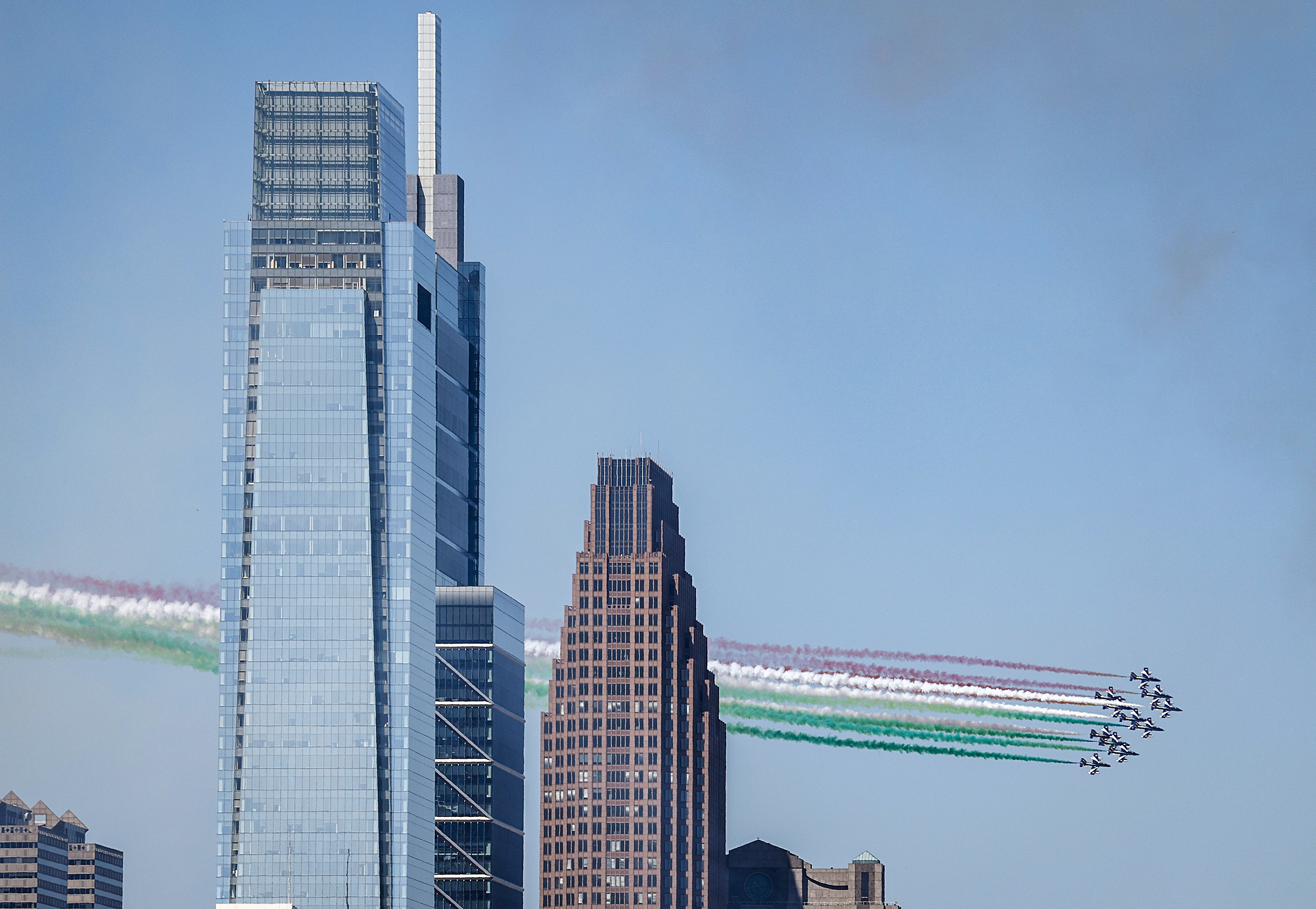 The Italian Air Force Frecce Tricolori flies over Center City Philadelphia on Monday, August 12, 2024.