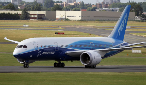 The Boeing 787 Dreamliner taxis after its landing at Le Bourget airport, east of Paris, upon its presentation for the first time at the 49th Paris Air Show at the airport, June 21, 2011.