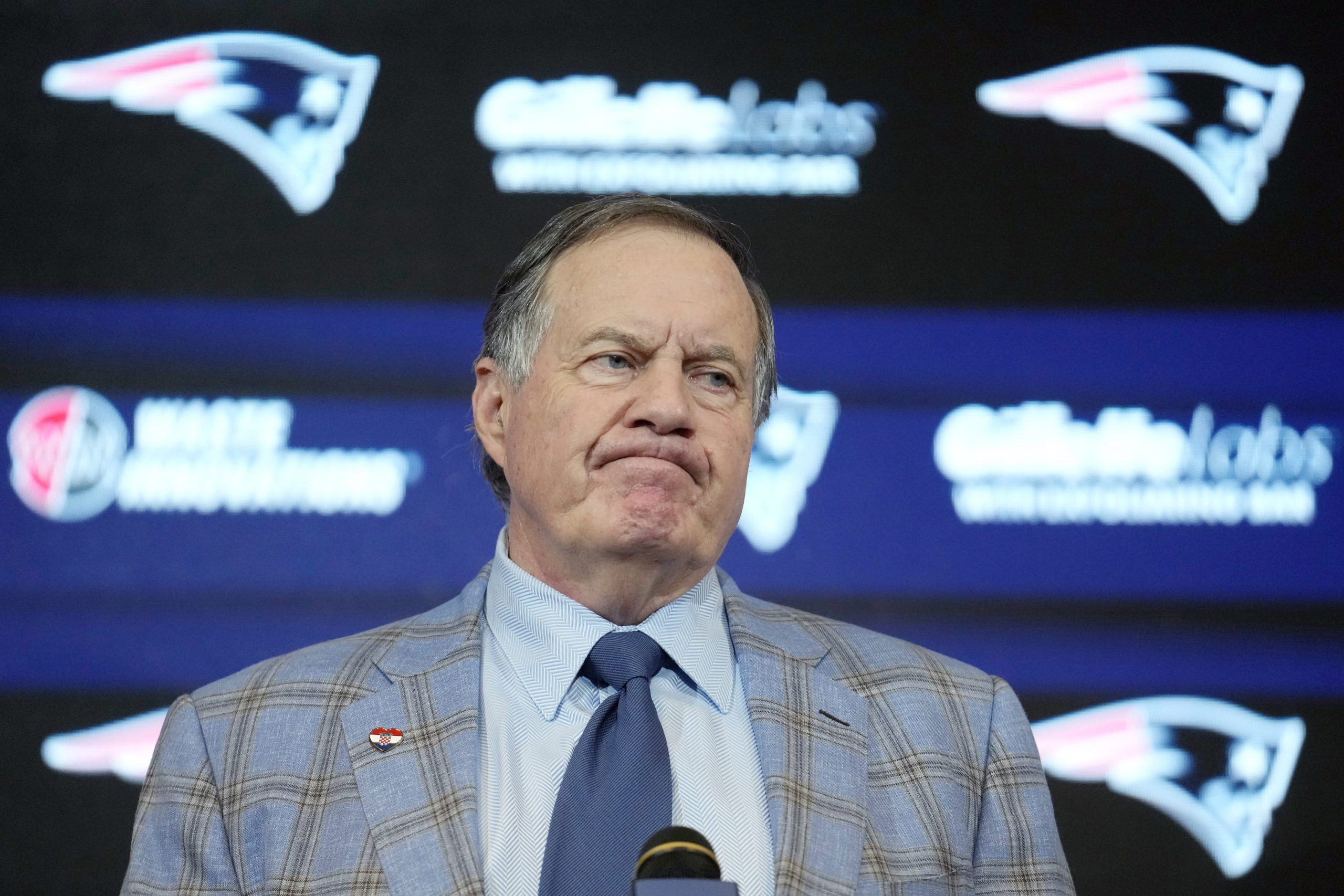 Former New England Patriots head coach Bill Belichick faces reporters during an NFL football news conference, January 11, 2024, in Foxborough, Massachusetts.