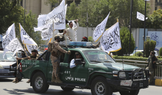 Taliban fighters celebrate the third anniversary of the withdrawal of US-led troops from Afghanistan, in Kabul, Afghanistan on Wednesday, August 14, 2024.