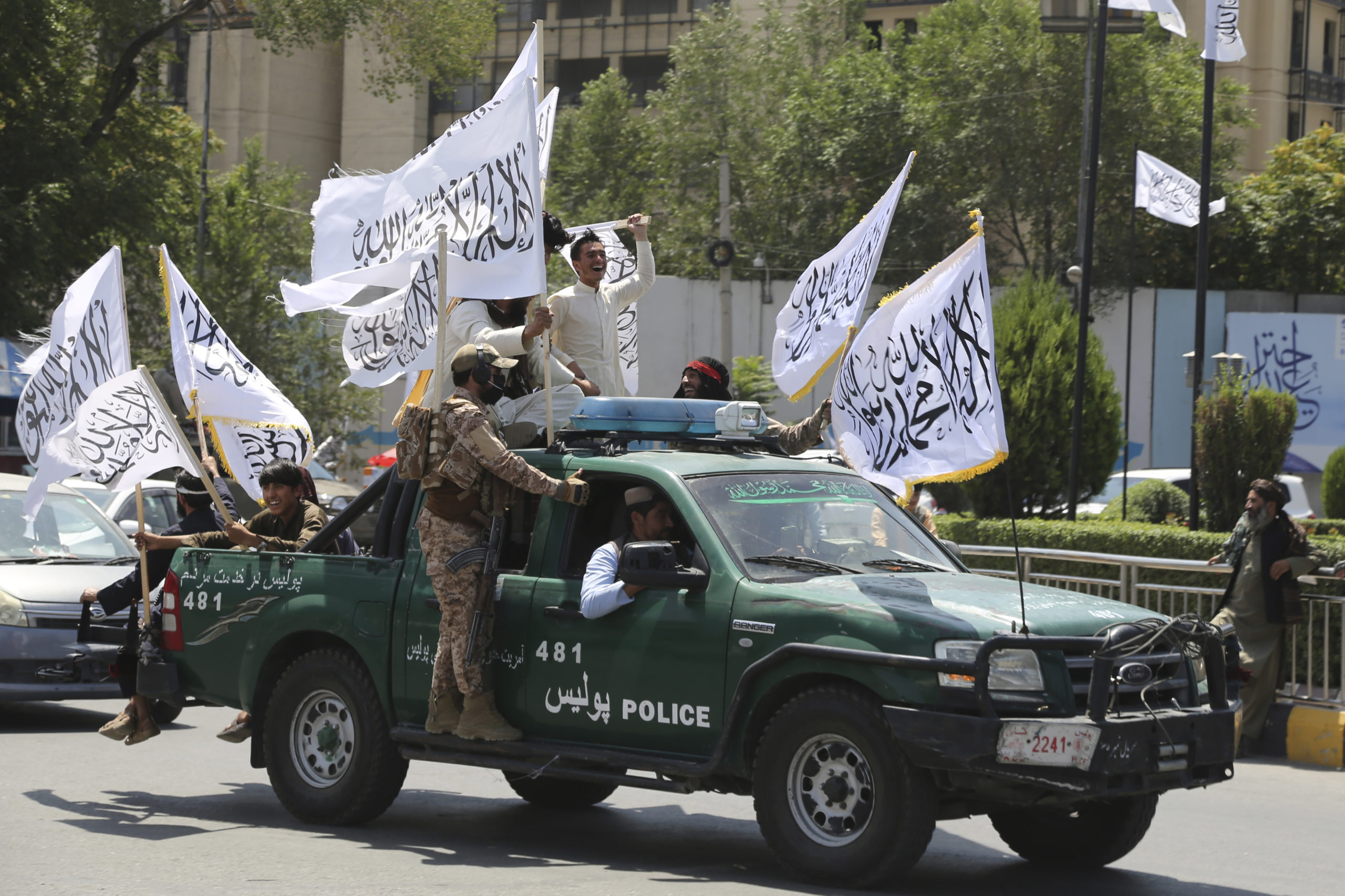 Taliban fighters celebrate the third anniversary of the withdrawal of US-led troops from Afghanistan, in Kabul, Afghanistan on Wednesday, August 14, 2024.