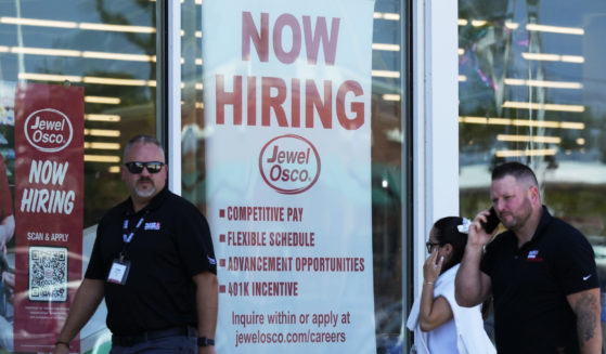 A hiring sign is displayed at a grocery store in Deerfield, Ill., Thursday, July 25, 2024. On Thursday, Aug. 1, 2024, the Labor Department reports on the number of people who applied for unemployment benefits last week.