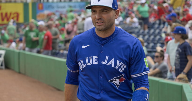 Toronto Blue Jays' Joey Votto walks to the dugout before a spring training baseball game against the Philadelphia Phillies, March 17, 2024, in Clearwater, Florida.