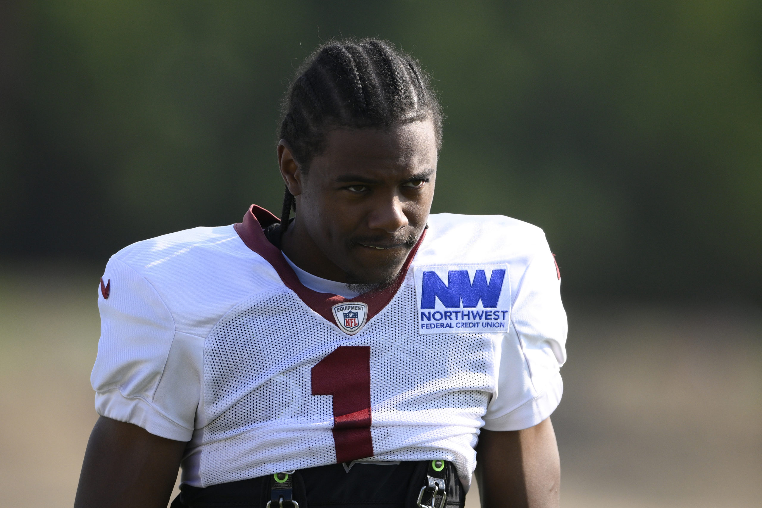 Washington Commanders wide receiver Jahan Dotson (1) works out during NFL football training camp, Monday, July 29, 2024, in Ashburn, Virginia.