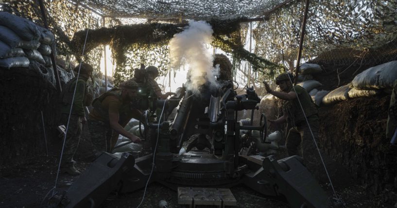 Ukrainian servicemen of 148th separate artillery brigade of the Air Assault Forces fire towards Russian positions by a M777 howitzer at the frontline in Donetsk region, Ukraine on Wednesday.