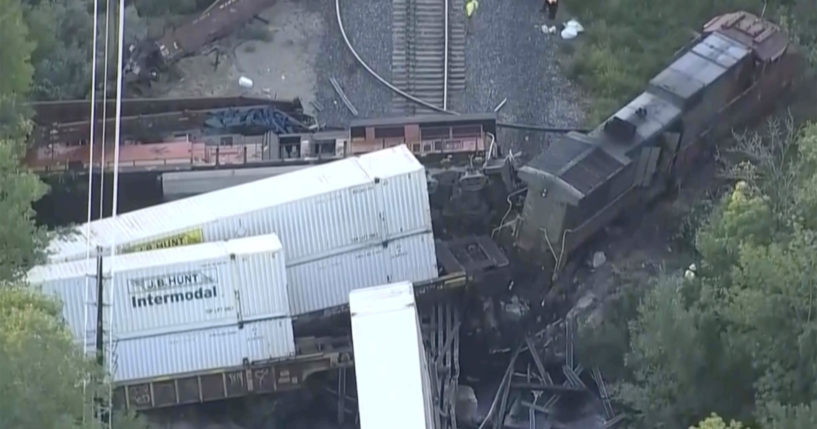 Investigators work the scene on Aug. 23, where two freight trains collided and derailed in Boulder, Colorado, on Aug. 23.