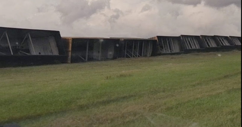 Railroad cars are knocked off the tracks due to high winds Wednesday night, near Steele, North Dakota, on Thursday.