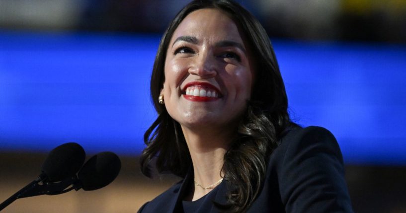 Rep. Alexandria Ocasio-Cortez speaks on stage on the first day of the Democratic National Convention in Chicago, Illinois, on Monday.