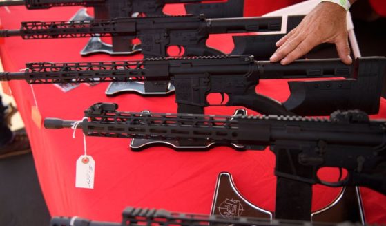 An AR-15 style rifle is displayed in a file photo from 2021.