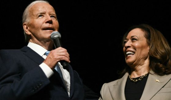 President Joe Biden and Vice President Kamala Harris speak in the overflow room at Prince George's Community College in Largo, Maryland, on Aug. 15.