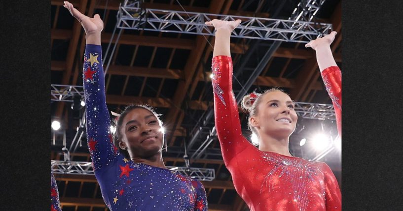 Gymnast Simone Biles, left, defended her social media digs at former Team USA Mykayla Skinner, right, seen at the Tokyo 2020 Olympic Games in Japan. Biles told People she is demonstrating "power" for her younger teammates. Meanwhile, Skinner has published online pleas for Biles to ask her followers to stop threatening Skinner and her family over comments made in an earlier interview over the 2024 team's work ethic.