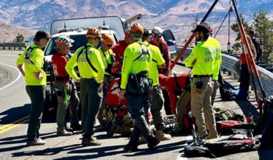 Washoe County’s Search and Rescue team prepares to recover the body of Patricia Portella-Wright on Thursday, after a drone captured footage of her body.