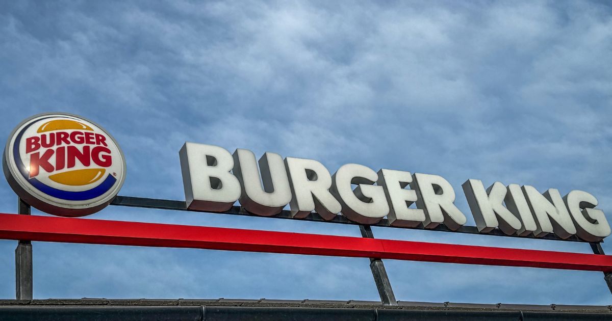 The logo of Burger King is pictured outside of a restaurant in Ilminster, England, on March 6.