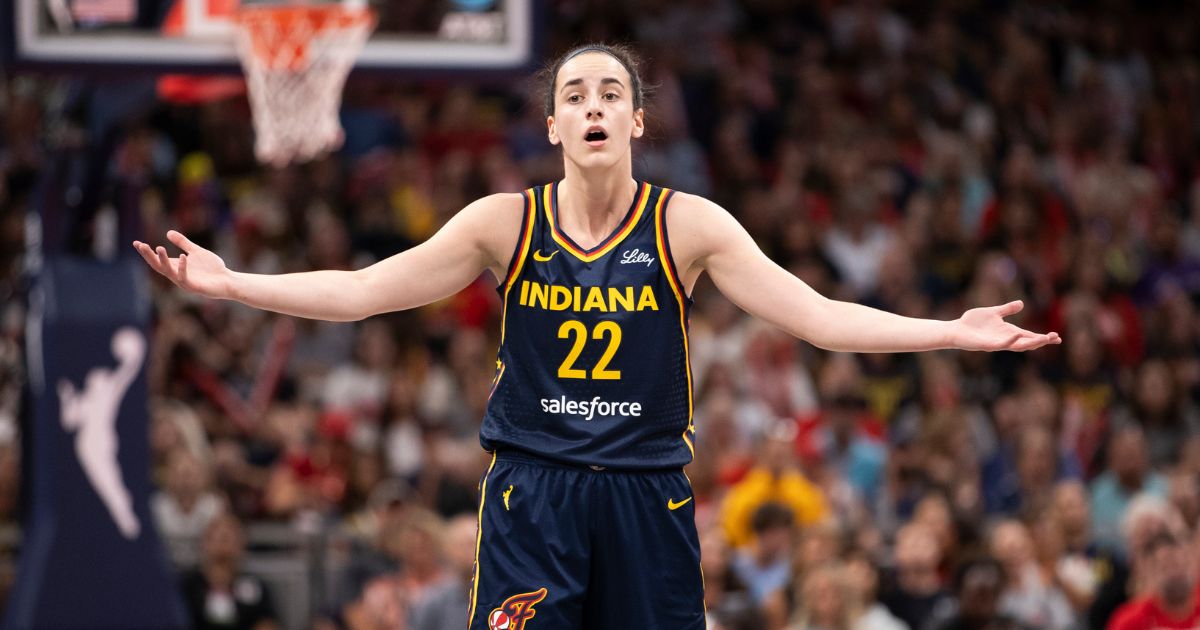 Caitlin Clark of the Indiana Fever reacts to a foul called in the first half of the game against the Seattle Storm in Indianapolis, Indiana, on Sunday.