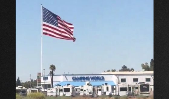 Camping World Ceo Marcus Lemonis refused orders to take down the company's signature giant U.S. flag.