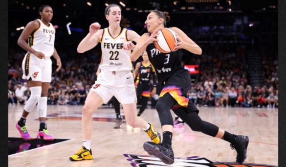 Guard Diana Taurasi #3 of the Phoenix Mercury drives against guard Caitlin Clark #22 of the Indiana Fever during the fourth quarter at Footprint Center on June 30 in Phoenix, Arizona. .