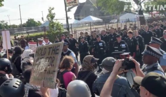 Pro-Palestinian protesters clashed with police in Chicago on Monday outside the DNC.