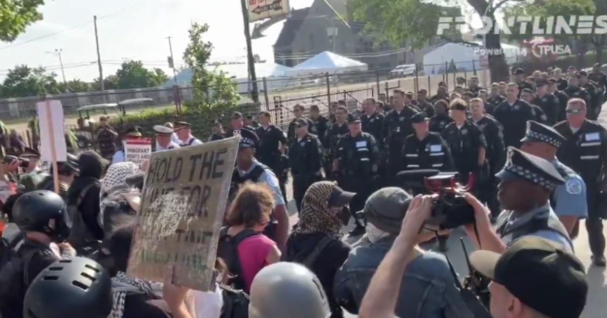 Pro-Palestinian protesters clashed with police in Chicago on Monday outside the DNC.