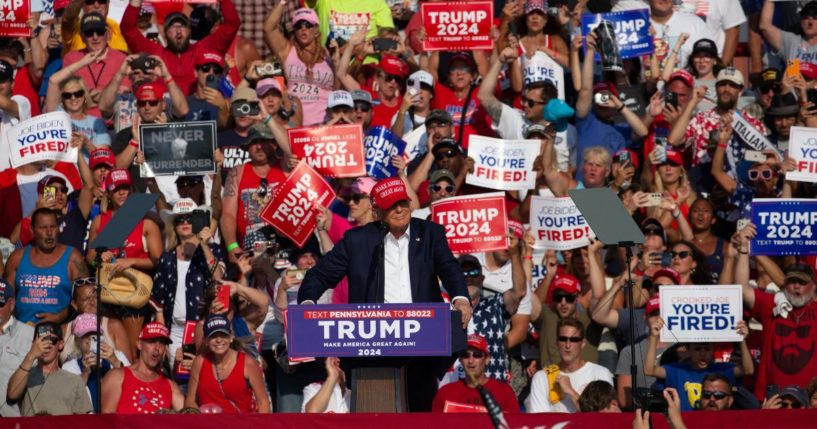 Former President Donald Trump, center, speaks at a campaign rally just moments before being shot by a would-be assassin in Butler, Pennsylvania, on July 13.