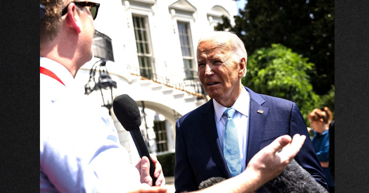 President Joe Biden speaks to Peter Doocy of Fox News and other reporters as he departs from the South Lawn of the White House Thursday in Washington, D.C..