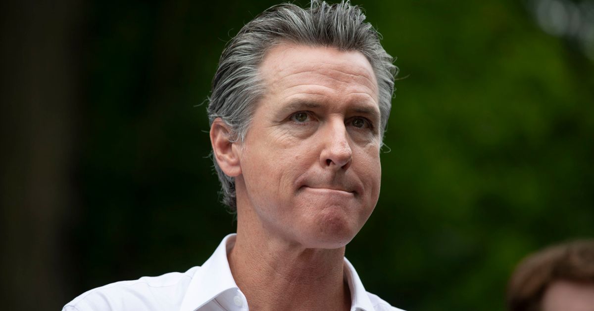 California Gov. Gavin Newsom campaigns for President Joe Biden at the Van Buren County Democratic Party's "BBQ for Biden-Harris" event in South Haven, Michigan, on July 4.