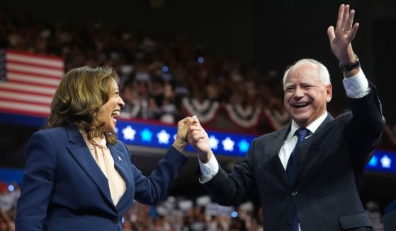 Vice President Kamala Harris and Democratic vice presidential candidate Minnesota Gov. Tim Walz greet supporters during a campaign event in Philadelphia, Pennsylvania, on Tuesday.