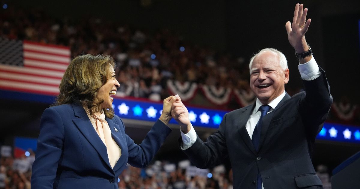 Vice President Kamala Harris and Democratic vice presidential candidate Minnesota Gov. Tim Walz greet supporters during a campaign event in Philadelphia, Pennsylvania, on Tuesday.