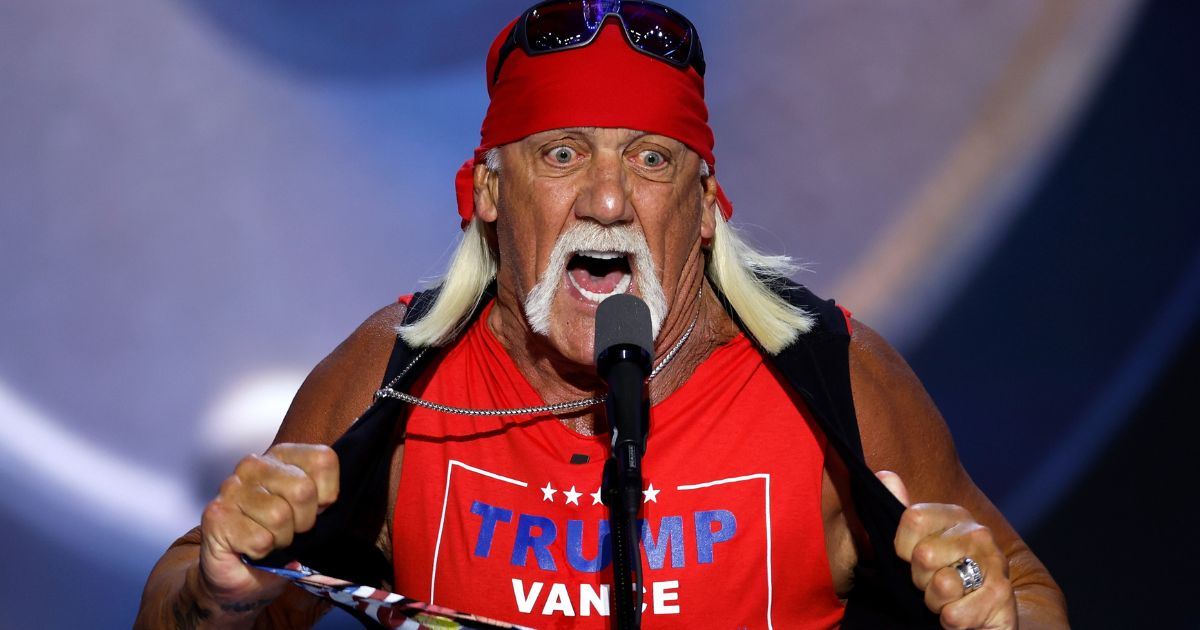 Hulk Hogan rips his shirt as he speaks on stage on the fourth day of the Republican National Convention in Milwaukee, Wisconsin, on July 18.