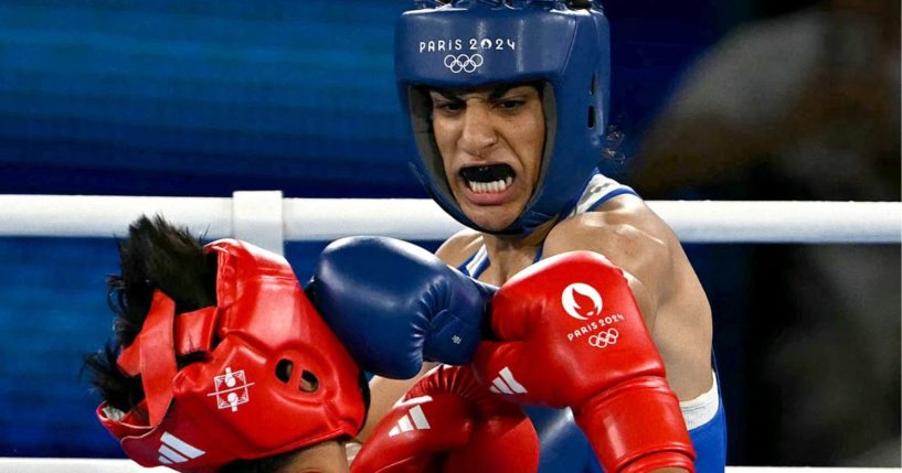 Algerian boxer Imane Khelif hits Thailand's Janjaem Suwannapheng during the women's 66kg semi-final boxing match in the Paris 2024 Olympic Games on Tuesday.