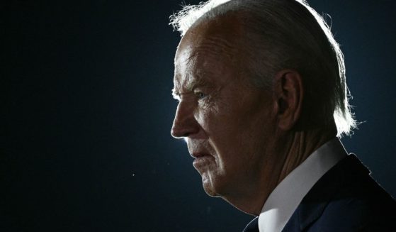 President Joe Biden talks to the media before the arrival of the prisoners released by Russia at Joint Base Andrews in Maryland on Thursday.