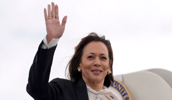 Vice President Kamala Harris waves as she boards Air Force Two at San Francisco International Airport in San Francisco, California, on Sunday.