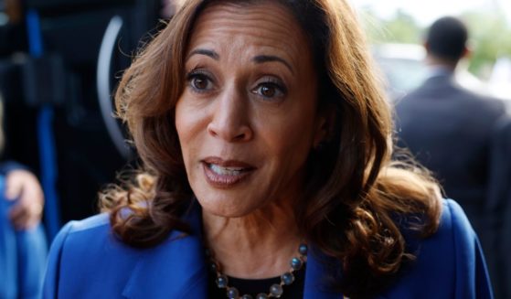 Vice President Kamala Harris speaks to reporters outside of Primanati Bros. Restaurant in Moon Township, Pennsylvania, on Sunday.